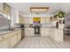 Bright kitchen featuring stainless steel appliances, and a breakfast bar at 1543 Reade Cir, St Cloud, FL 34772