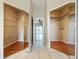 View of large closets with mirrored doors and hardwood flooring, providing ample storage at 2150 Emperor Dr., Kissimmee, FL 34744