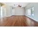 Spacious living room with wood floors, neutral paint, and natural light at 2150 Emperor Dr., Kissimmee, FL 34744