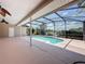 Enclosed lanai features a refreshing pool, perfect for relaxation and outdoor entertaining at 2150 Emperor Dr., Kissimmee, FL 34744