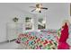 Inviting bedroom with two beds, complemented by natural light and bright decor at 2473 Saint Augustine Blvd, Haines City, FL 33844