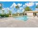 Sparkling community pool offers a refreshing escape, with seating and nearby shade at 2473 Saint Augustine Blvd, Haines City, FL 33844