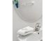 Bathroom with white sink, modern faucet, and white countertop at 2628 Tranquility Way, Kissimmee, FL 34746