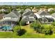 Aerial view of the home's backyard with a screened-in pool at 3138 Dark Sky Dr, St Cloud, FL 34773