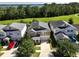 Aerial view showcasing a two-story home and well maintained lawn at 3138 Dark Sky Dr, St Cloud, FL 34773