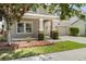 Close up of charming two-story home with landscaped yard and stone accents at 3138 Dark Sky Dr, St Cloud, FL 34773