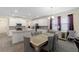 Updated kitchen with stainless steel appliances, open to the dining and living area at 3138 Dark Sky Dr, St Cloud, FL 34773