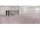 Upstairs loft with carpet and a great place to relax or use as a play area at 3138 Dark Sky Dr, St Cloud, FL 34773