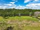 Aerial view of community park with soccer field and walking path at 3428 Sagebrush St, St Cloud, FL 34773