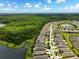 Beautiful aerial view of a community with ponds and lush greenery, offering serene lakeside living at 3428 Sagebrush St, St Cloud, FL 34773
