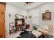 Inviting office space featuring a wooden desk, chairs, and cow print rug for added style at 3428 Sagebrush St, St Cloud, FL 34773