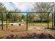 Community playground with swings for children to enjoy on a sunny day at 3428 Sagebrush St, St Cloud, FL 34773