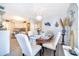 Formal dining room with elegant decor, adjacent to the kitchen, and open view to the kitchen at 4403 S Semoran Blvd # 2, Orlando, FL 32822