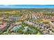 Stunning aerial view capturing the community's layout, amenities, and its proximity to lush green spaces at 4416 Acorn Ct, Davenport, FL 33837