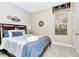 This bedroom features a cozy Queen-sized bed, stylish decor, and a relaxing atmosphere at 4416 Acorn Ct, Davenport, FL 33837