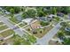Aerial view of a quaint home with palm trees in a residential neighborhood at 4420 Lake Lawne Ave, Orlando, FL 32808