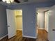 This bedroom boasts wood floors and multiple closets for ample storage options at 492 Banyon Tree Cir # 204, Maitland, FL 32751