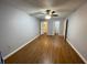 Bedroom featuring hard wood floors and multiple closets for storage at 492 Banyon Tree Cir # 204, Maitland, FL 32751