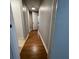 Hallway features wood flooring and neutral wall paint at 492 Banyon Tree Cir # 204, Maitland, FL 32751
