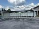 Exterior shot of multiple mailboxes for community residents under a canopy at 492 Banyon Tree Cir # 204, Maitland, FL 32751