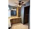 Bathroom featuring a vanity with storage, a mirror with lighting, and a neutral color scheme at 503 Tivoli Park Dr, Davenport, FL 33897