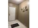 Inviting entryway with tile flooring and decorative wall art at 503 Tivoli Park Dr, Davenport, FL 33897
