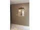 Clean and well-maintained hallway with a mirror and neutral decor at 503 Tivoli Park Dr, Davenport, FL 33897