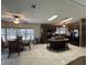 Open kitchen features a large island, modern appliances, and plenty of natural light from the many windows at 503 Tivoli Park Dr, Davenport, FL 33897