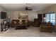 Inviting living room with neutral tones, plush seating, and a serene atmosphere at 503 Tivoli Park Dr, Davenport, FL 33897