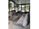 Relaxing screened-in lanai with seating and table perfect for entertaining at 503 Tivoli Park Dr, Davenport, FL 33897