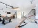 Garage featuring an air hockey table, basketball hoop, and foosball table, perfect for entertainment at 521 Rena Dr, Davenport, FL 33897
