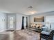Cozy living room with stylish decor, including a comfortable sofa, and a glass-topped coffee table at 521 Rena Dr, Davenport, FL 33897