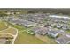 Gorgeous aerial view showcases homes with lush landscaping, sidewalks, and community features at 527 Amadoras Way, St Cloud, FL 34771