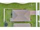 Birds-eye view of the property and roof along with the backyard, fence, and driveway at 527 Amadoras Way, St Cloud, FL 34771