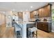 Stylish kitchen with stainless steel appliances, a large island, and ample counter space at 527 Amadoras Way, St Cloud, FL 34771