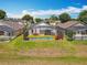 This property boasts a private screened-in pool, perfect for outdoor enjoyment and relaxation in a serene setting at 550 Canary Island Cir, Davenport, FL 33837