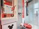 Modern bathroom with white subway tile shower and Mickey Mouse themed decor at 550 Canary Island Cir, Davenport, FL 33837