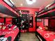 Whimsical bedroom featuring two bunk beds adorned with Mickey Mouse themed decor at 550 Canary Island Cir, Davenport, FL 33837