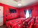 Bedroom featuring Disney themed bedding, wall art and décor at 550 Canary Island Cir, Davenport, FL 33837