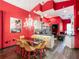 Bright dining area blends seamlessly with a modern kitchen, featuring open floor plan and decor at 550 Canary Island Cir, Davenport, FL 33837