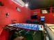 Fun game room featuring foosball, karaoke, and arcade games, creating an exciting atmosphere at 550 Canary Island Cir, Davenport, FL 33837