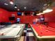 Spacious game room with an air hockey table, pool table, arcade games, and Karaoke at 550 Canary Island Cir, Davenport, FL 33837