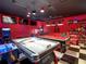 Spacious game room features an array of entertainment options, perfect for Gathering fun at 550 Canary Island Cir, Davenport, FL 33837