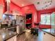 Modern kitchen featuring stainless steel appliances, sleek countertops, and a breakfast bar at 550 Canary Island Cir, Davenport, FL 33837