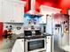 Modern kitchen featuring stainless steel appliances, sleek countertops, and stylish backsplash at 550 Canary Island Cir, Davenport, FL 33837