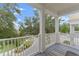 Balcony with white railing overlooking a scenic landscape at 7509 Mourning Dove Cir # 303, Reunion, FL 34747