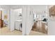 Bright interior view featuring the washer/dryer closet and an open floor plan at 7509 Mourning Dove Cir # 303, Reunion, FL 34747