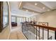 Spacious upstairs game room with a billiards table, comfortable seating, and plenty of natural light at 7550 Gathering Dr, Reunion, FL 34747