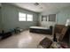 Good sized bedroom with lots of light and terrazzo floors offers flexibility at 930 Aultman Rd, Kissimmee, FL 34744