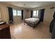 Bedroom with windows and closet at 930 Aultman Rd, Kissimmee, FL 34744